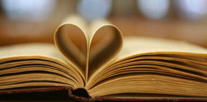 Book pages folded to form a heart